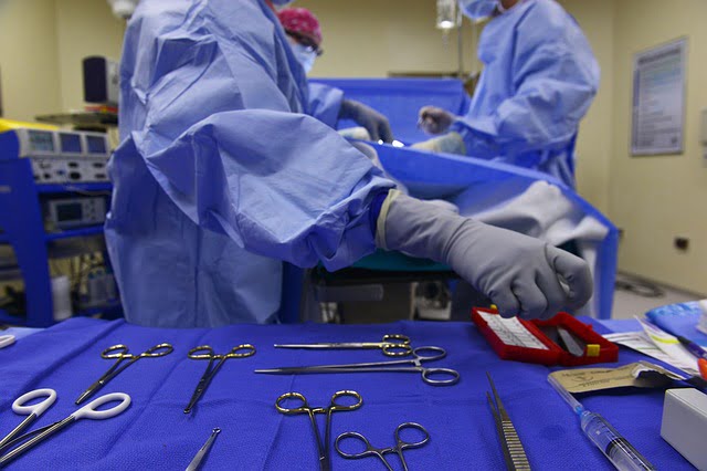 Surgeon doing Breast Implant Surgery