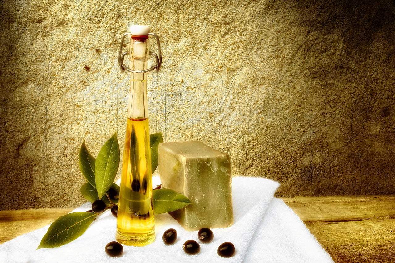 Bottle of Olive Oil on Table