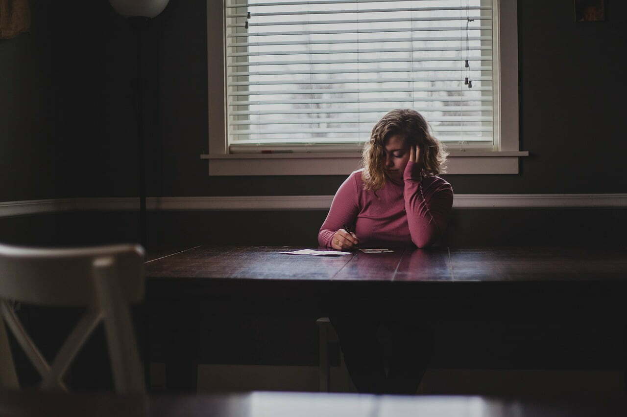 Woman sitting and thinking