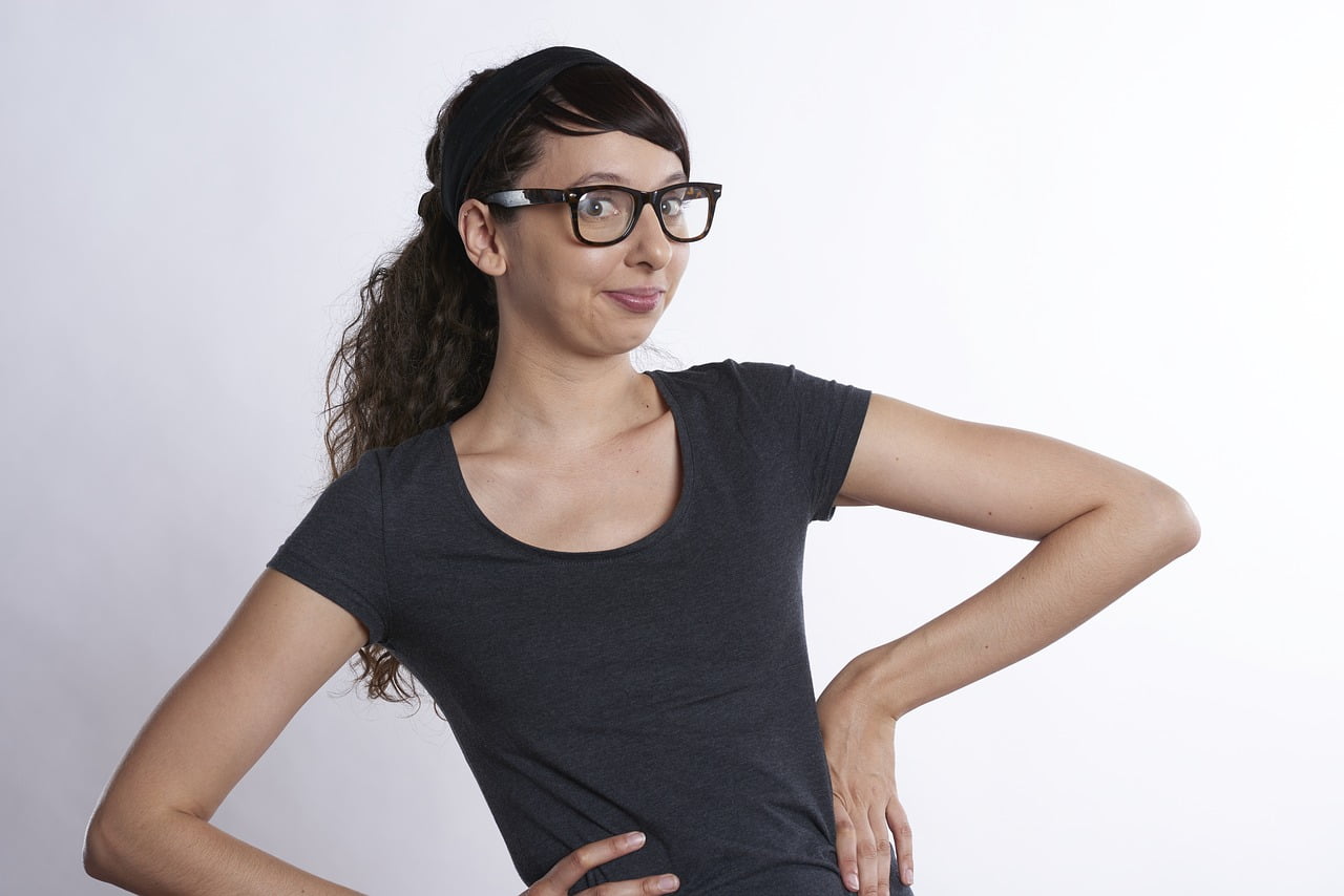 woman in glasses looking quirky