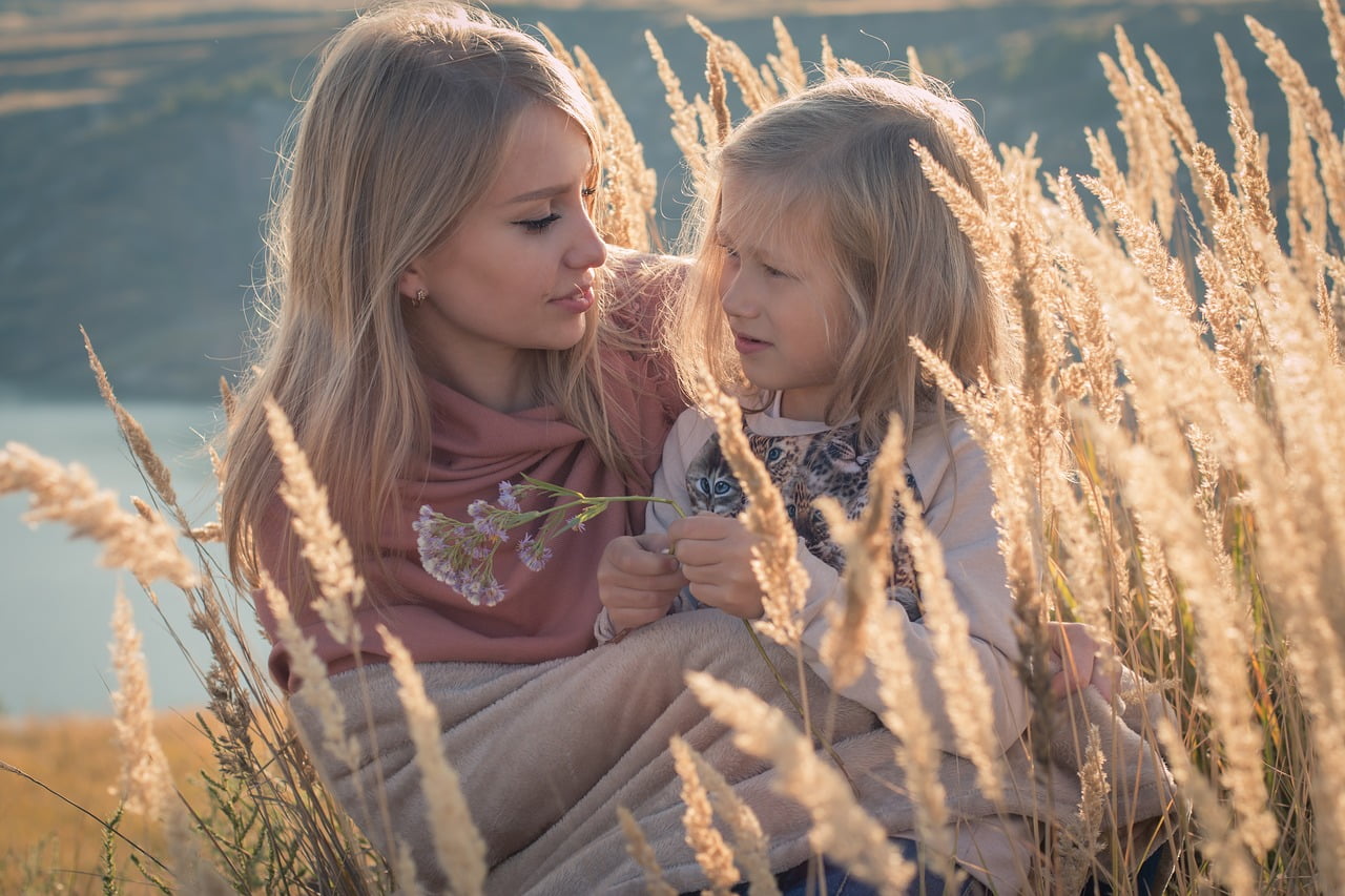 mother and daughter in field