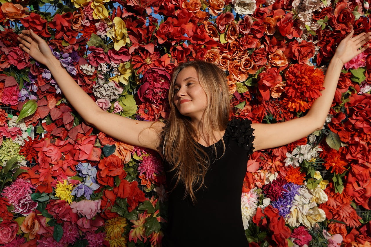 woman and flowers women's health