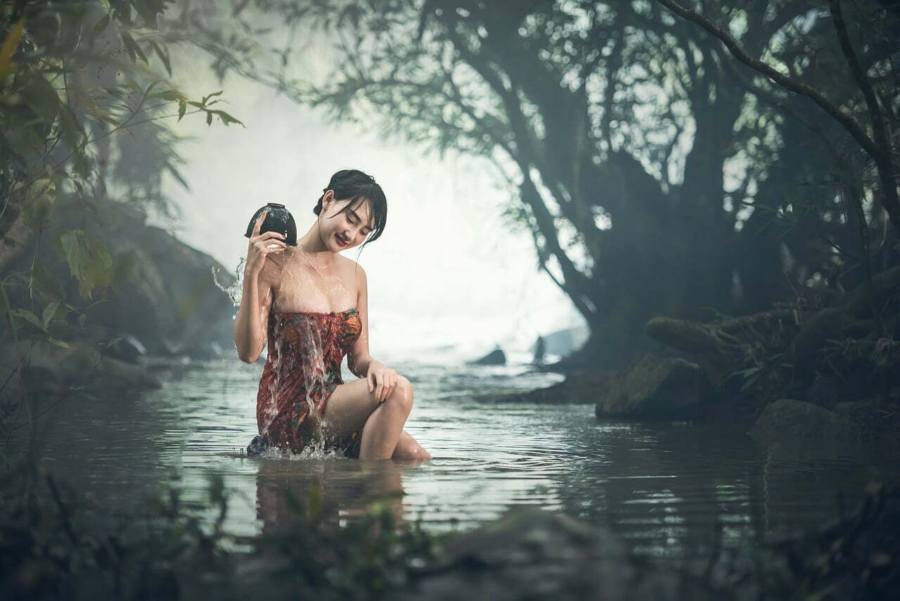 woman in pond beauty hair