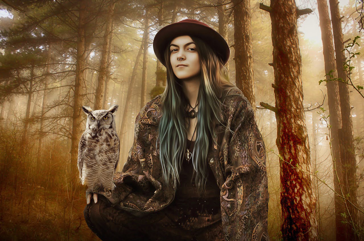 woman in woods with owl