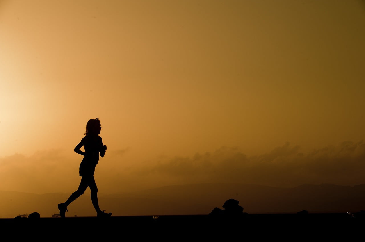 woman running during dusk