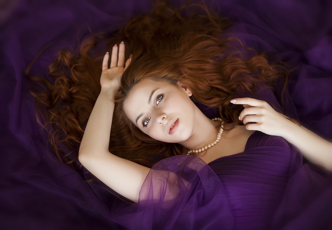 woman red hair purple dress