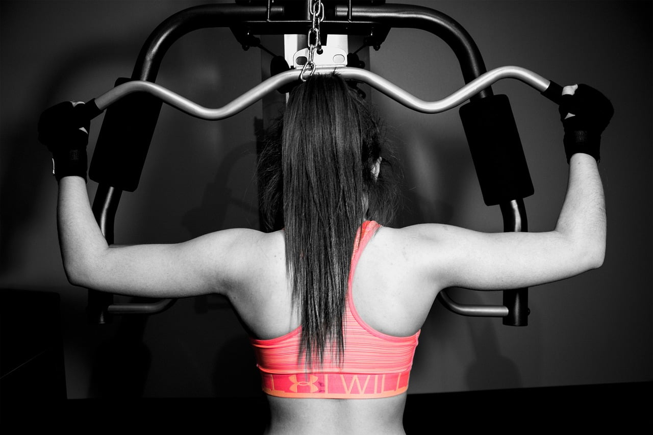 woman lat pull-down exercise