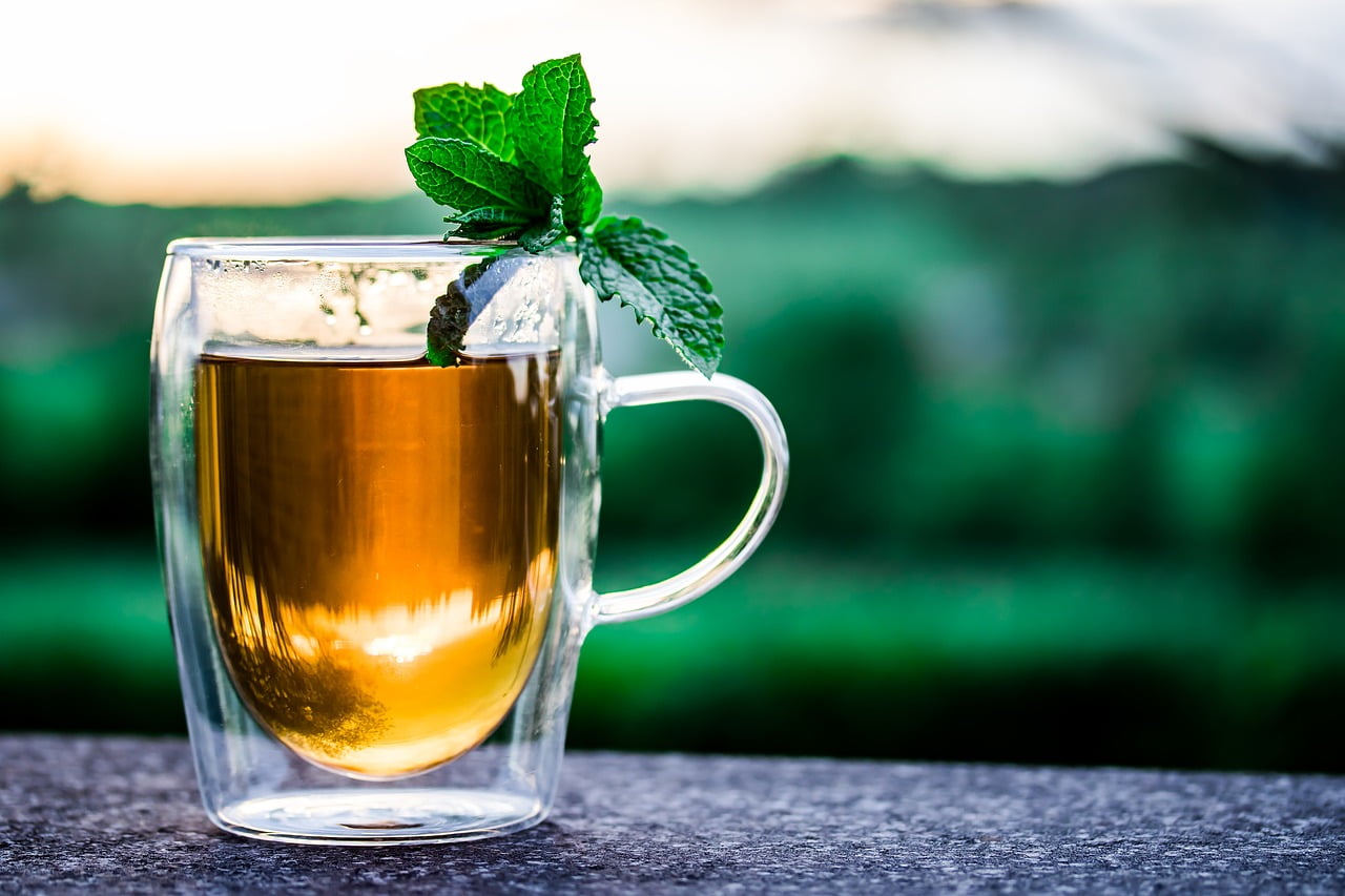 mug of tea with mint leaf