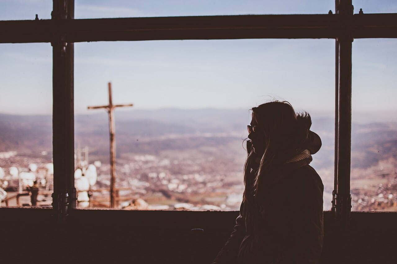 woman outside balcony