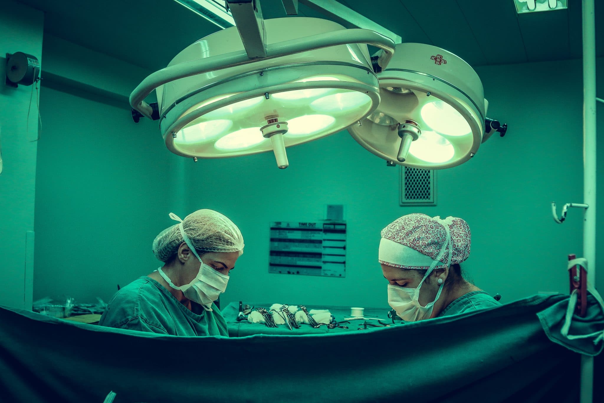 two-person-doing-surgery-inside-room-1250655